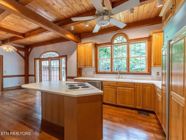 kitchen featuring wood ceiling, a kitchen island, hanging light fixtures, and light hardwood / wood-style flooring