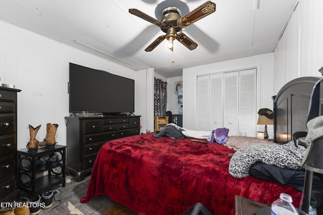 bedroom featuring ceiling fan and a closet