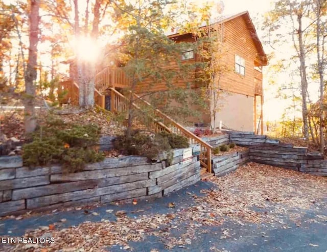 view of side of property featuring a garage