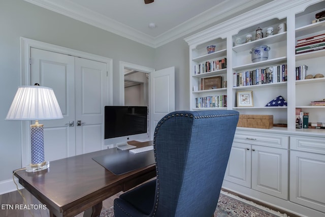 office featuring crown molding and hardwood / wood-style flooring