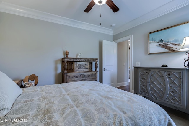 bedroom with ceiling fan and ornamental molding