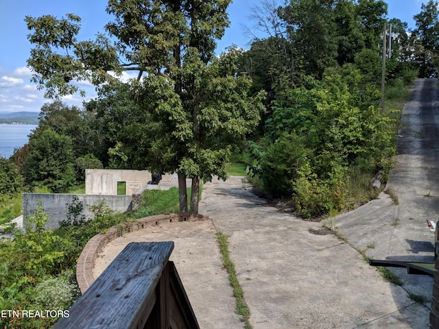 view of home's community with a water view