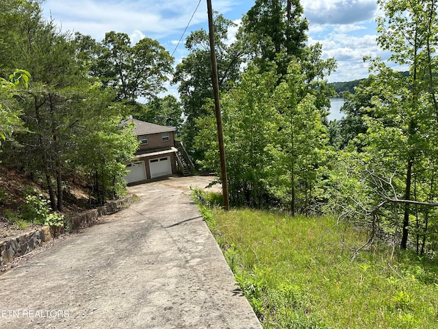 view of side of property featuring a garage