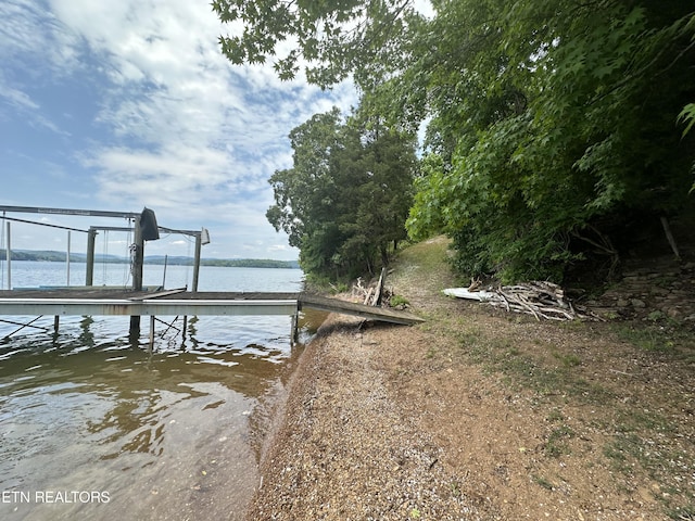 view of dock with a water view