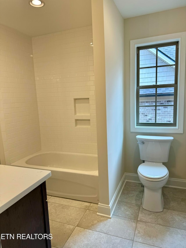 full bathroom with tile patterned floors, vanity, toilet, and bathtub / shower combination