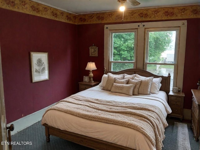 carpeted bedroom featuring ceiling fan