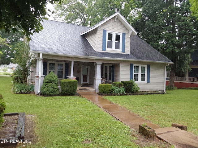 view of front of property with a front lawn