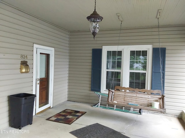 view of patio featuring a porch