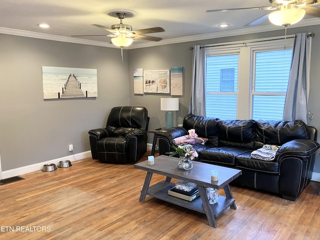 living room with ceiling fan, crown molding, and hardwood / wood-style floors