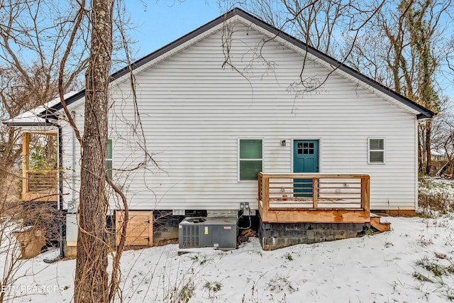 view of snow covered house