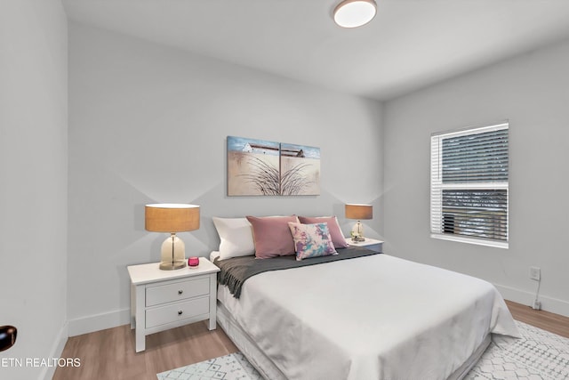 bedroom featuring light wood-type flooring