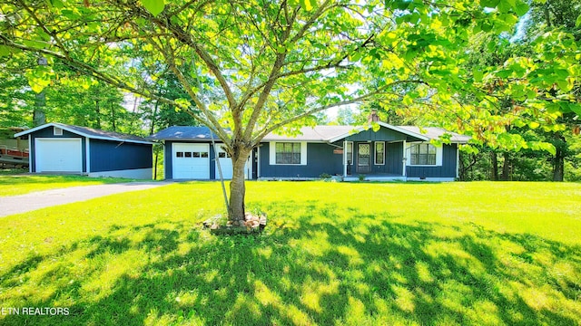 ranch-style house with a front lawn and a garage