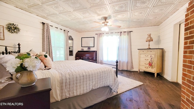 2109 Key Way, Sevierville, TN 37876 - bedroom featuring an ornate ceiling, hardwood / wood-style floors, wooden walls, and ceiling fan