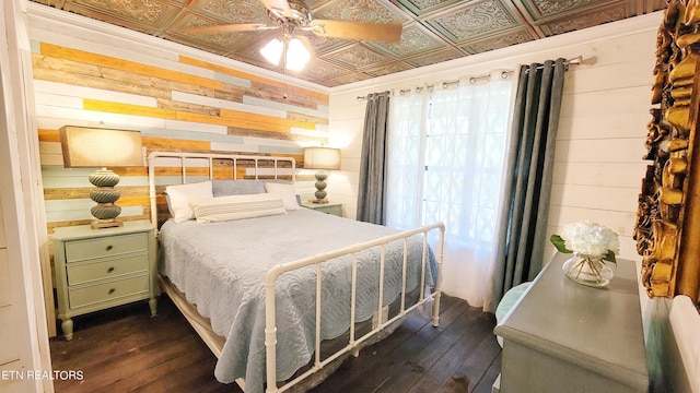2109 Key Way, Sevierville, TN 37876 - bedroom with dark wood-style floors, an ornate ceiling, wooden walls, and ceiling fan