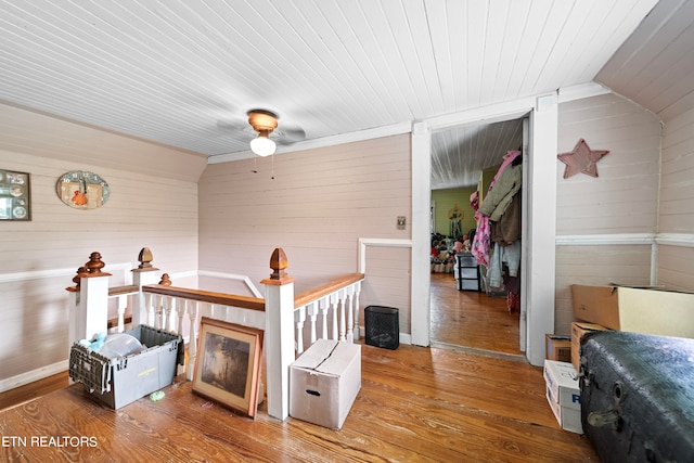 living room with wooden ceiling, hardwood / wood-style flooring, and lofted ceiling