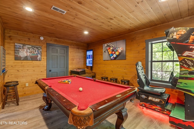 playroom featuring light wood-type flooring, wood ceiling, wood walls, and billiards