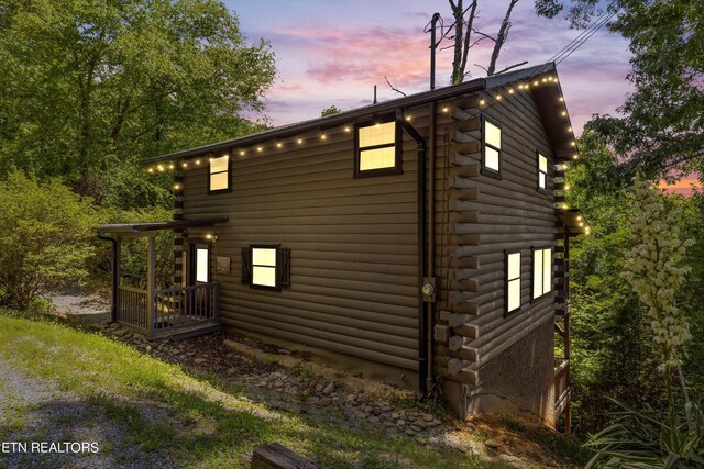 view of property exterior at dusk