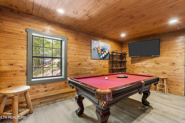 rec room with hardwood / wood-style floors, pool table, wood ceiling, and wooden walls