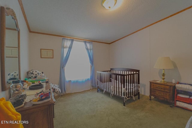 bedroom with carpet flooring, crown molding, a nursery area, and lofted ceiling