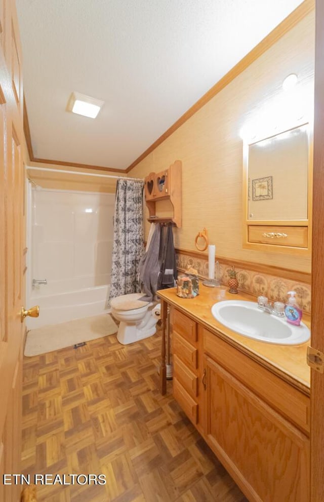 full bathroom with vanity, crown molding, toilet, shower / bath combo with shower curtain, and parquet flooring