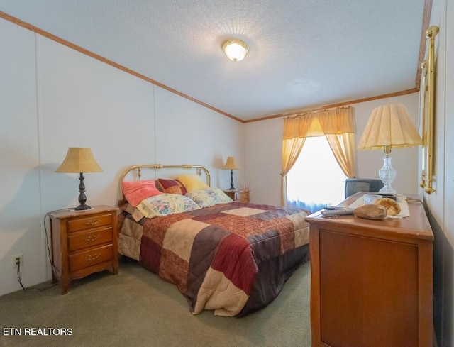 carpeted bedroom featuring crown molding and a textured ceiling