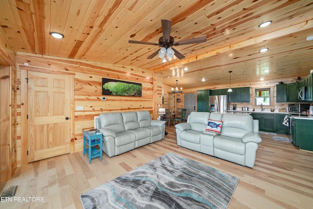 living room with wooden ceiling, light hardwood / wood-style flooring, and wooden walls