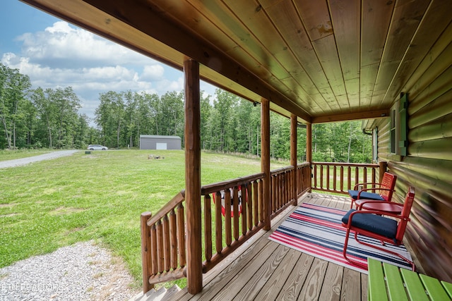 deck featuring a lawn