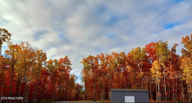 exterior space featuring an outbuilding