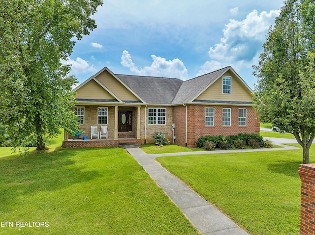 craftsman-style house featuring a front yard and a porch