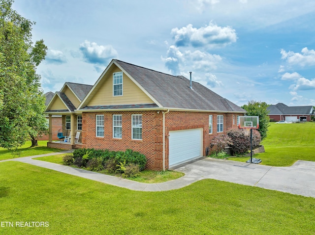 view of front facade with a garage and a front lawn