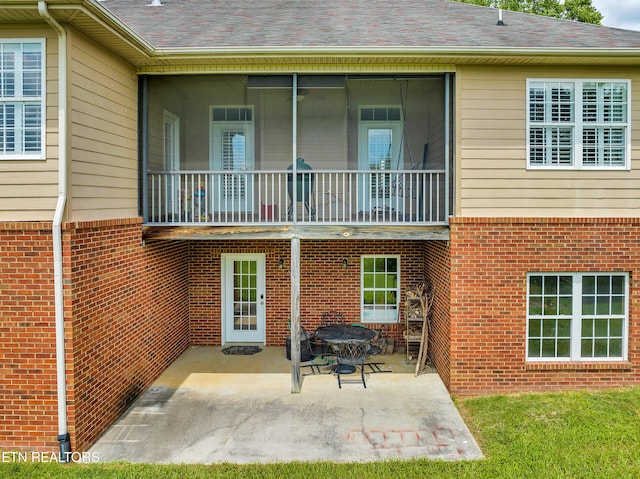 back of house with a patio area