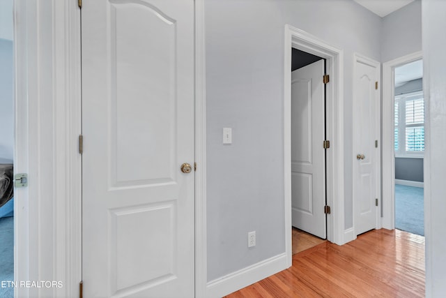 hall featuring light hardwood / wood-style flooring