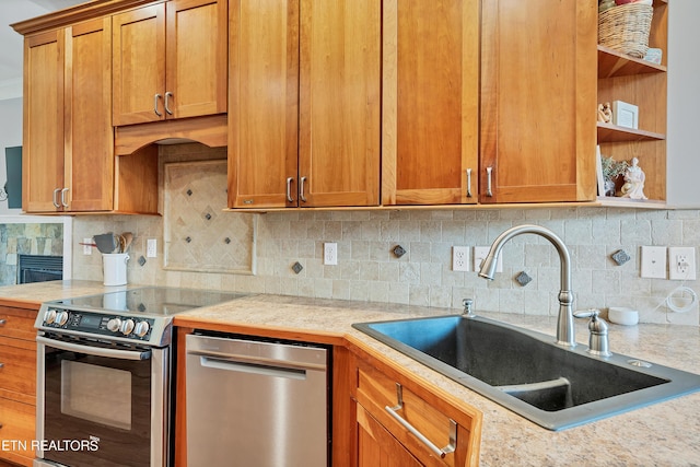 kitchen with stainless steel appliances, tasteful backsplash, and sink