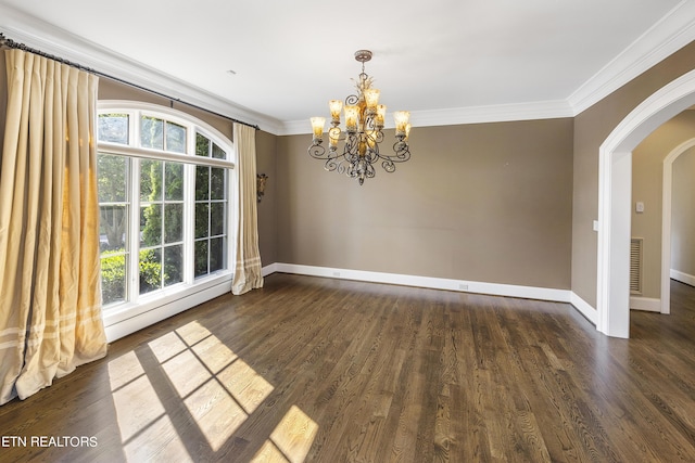 unfurnished dining area featuring a chandelier, ornamental molding, and a wealth of natural light