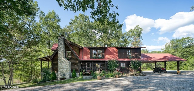 view of front of home with a carport