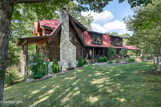 view of front of house featuring a front lawn and a porch