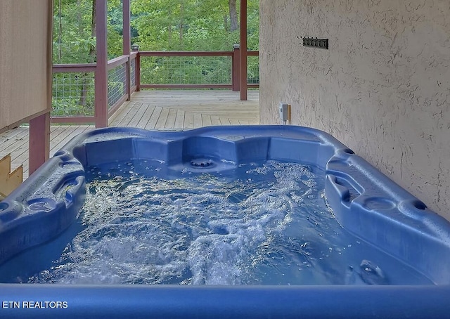 exterior space with a jacuzzi