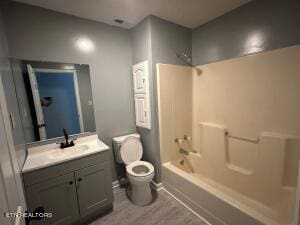 full bathroom featuring hardwood / wood-style floors, shower / bathtub combination, vanity, and toilet