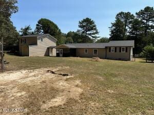 exterior space featuring a front lawn