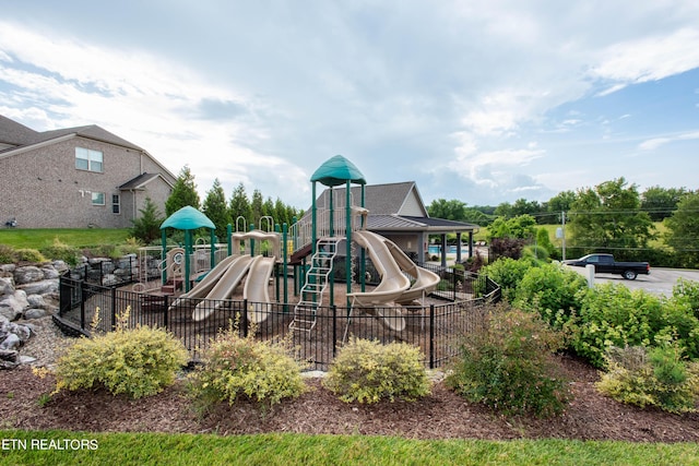 community play area featuring fence