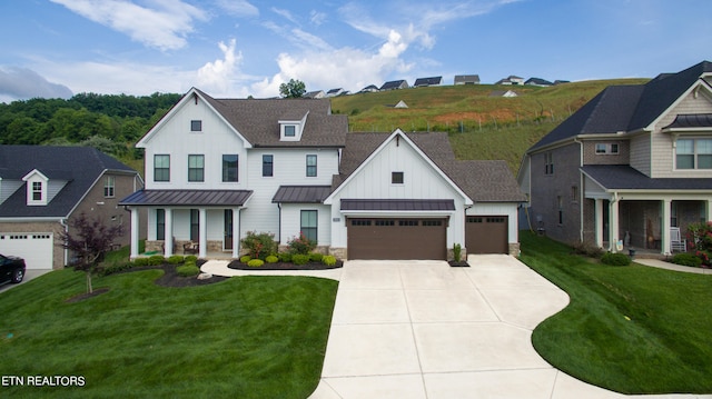 view of front of home with a front lawn and covered porch