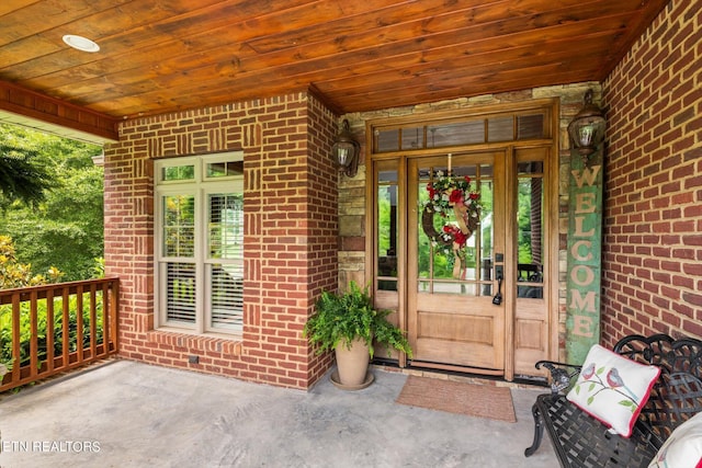 property entrance featuring covered porch