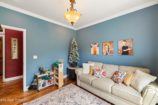 living room with dark wood-type flooring and ornamental molding