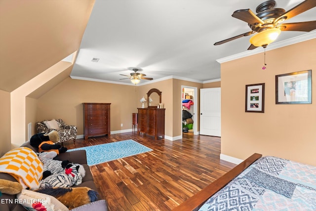 bedroom featuring dark hardwood / wood-style floors, ceiling fan, and crown molding