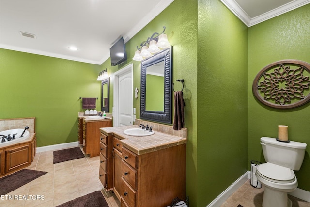 bathroom featuring tile patterned floors, vanity, crown molding, toilet, and a tub