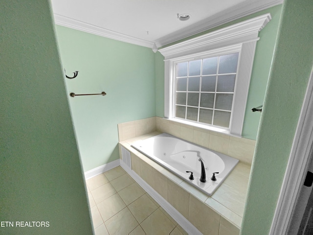 bathroom featuring tile patterned flooring, crown molding, and tiled tub