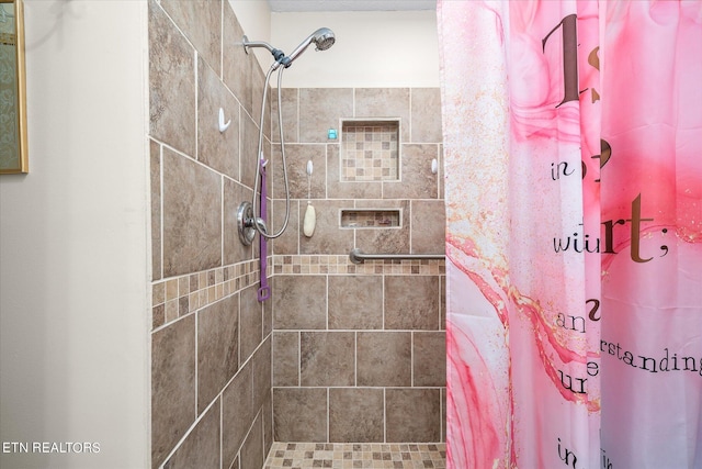 bathroom with a shower with shower curtain