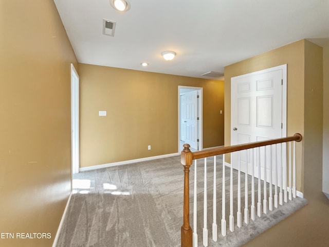 empty room with carpet flooring