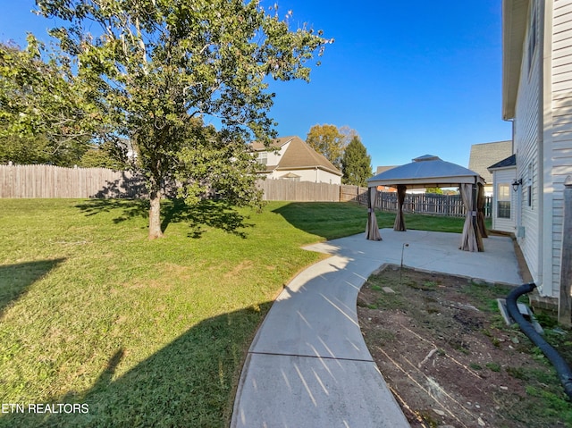 view of yard with a patio and a gazebo