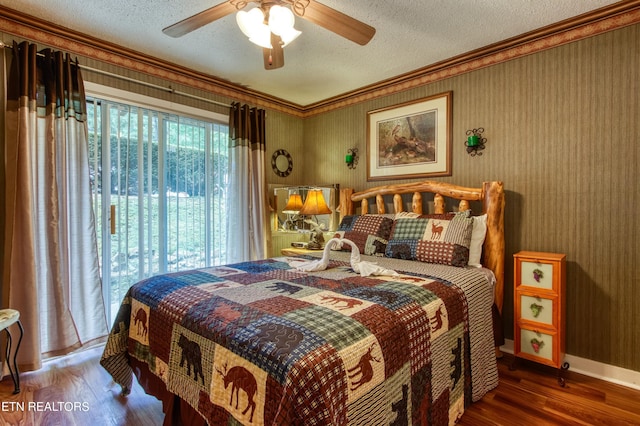 1081 Cove Rd Unit 1012, Sevierville, TN 37876 - bedroom with ornamental molding, a textured ceiling, wood finished floors, and ceiling fan